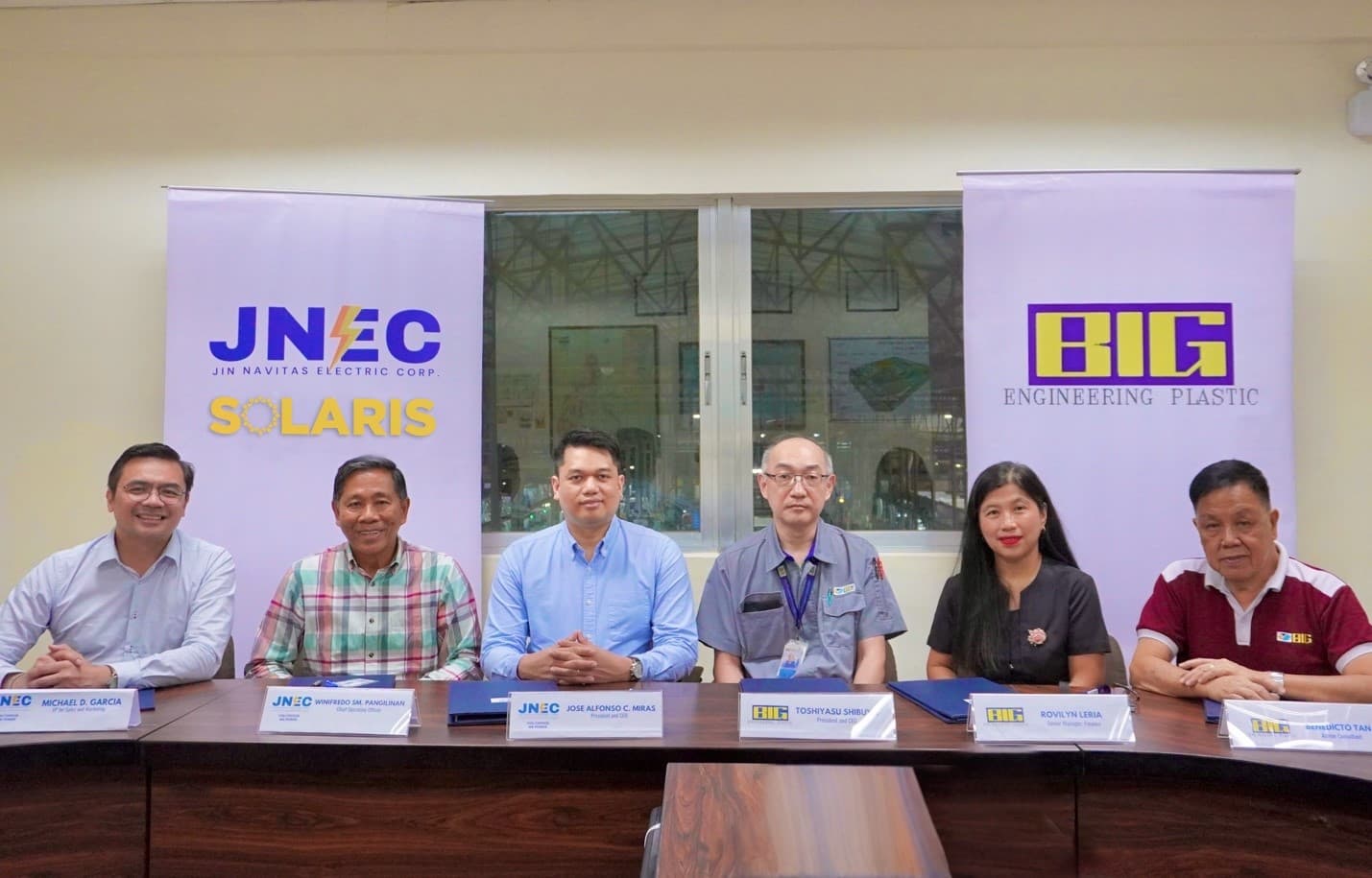 JNEC and Big Philippines representatives during the ceremonial signing